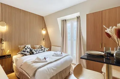 Un ou plusieurs lits dans un hébergement de l'établissement Superbe Studio Tour Eiffel Trocadero by Studioprestige