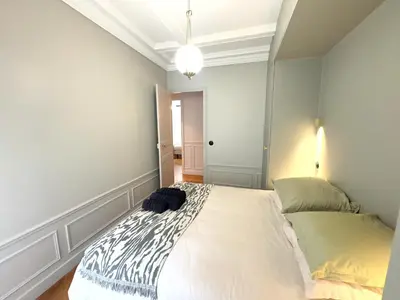 Un ou plusieurs lits dans un hébergement de l'établissement Parisian Luxury Style - Heart of Montparnasse