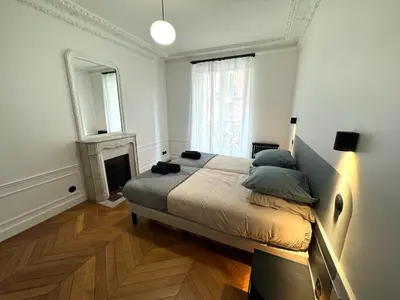 Un ou plusieurs lits dans un hébergement de l'établissement Parisian Luxury Style - Heart of Montparnasse