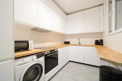 Cuisine ou kitchenette dans l'établissement Magnifique appartement parisien