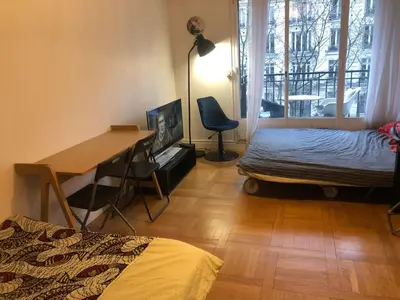 Un ou plusieurs lits dans un hébergement de l'établissement Beautiful apartment,South Paris