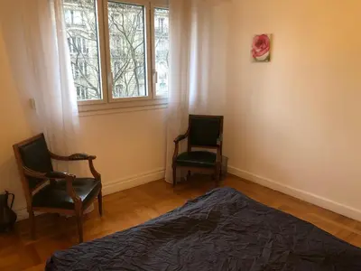 Un ou plusieurs lits dans un hébergement de l'établissement Beautiful apartment,South Paris