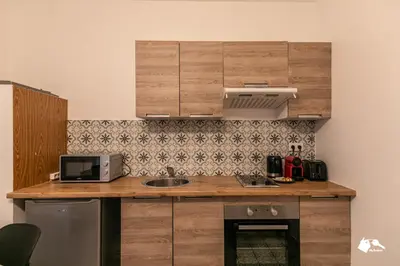 Cuisine ou kitchenette dans l'établissement MBA - Pétion Splendide Appart