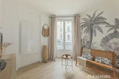 Coin salon dans l'établissement Flexliving - studio - Guénot