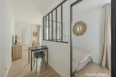 Un ou plusieurs lits dans un hébergement de l'établissement Flexliving - studio - Guénot