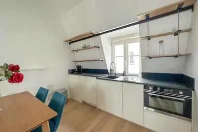 Cuisine ou kitchenette dans l'établissement Flexliving - appartement - Beauregard
