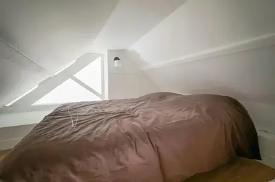 Un ou plusieurs lits dans un hébergement de l'établissement Flexliving - appartement - Beauregard
