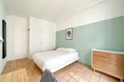 Un ou plusieurs lits dans un hébergement de l'établissement Flexliving - room - Echiquier