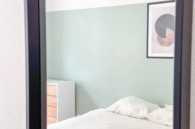 Un ou plusieurs lits dans un hébergement de l'établissement Flexliving - room - Echiquier