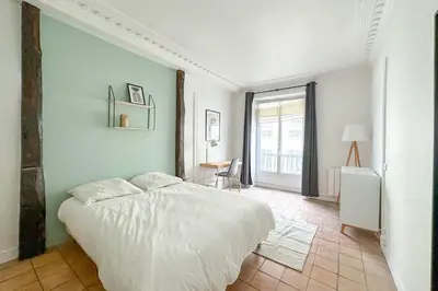 Un ou plusieurs lits dans un hébergement de l'établissement Flexliving - room - Échiquier