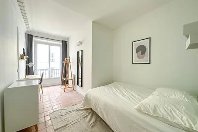 Un ou plusieurs lits dans un hébergement de l'établissement Flexliving - room - Echiquier
