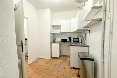 Cuisine ou kitchenette dans l'établissement Flexliving - whole flat - Echiquier