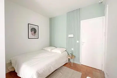 Un ou plusieurs lits dans un hébergement de l'établissement Flexliving - whole flat - Echiquier