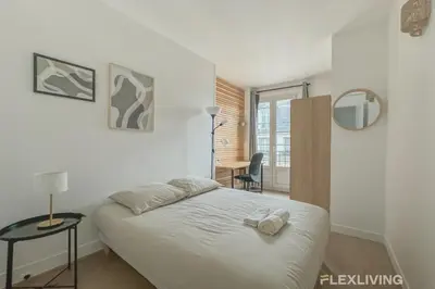 Un ou plusieurs lits dans un hébergement de l'établissement Flexliving - whole flat - Batelière