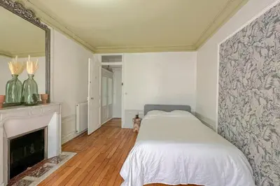 Un ou plusieurs lits dans un hébergement de l'établissement Flexliving - whole flat - Bachaumont