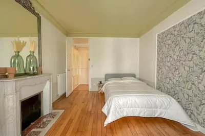 Un ou plusieurs lits dans un hébergement de l'établissement Flexliving - room - Bachaumont