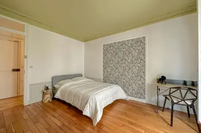 Un ou plusieurs lits dans un hébergement de l'établissement Flexliving - room - Bachaumont