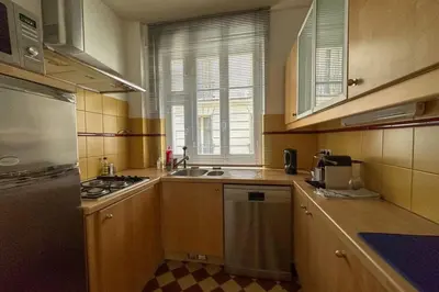 Cuisine ou kitchenette dans l'établissement Flexliving - room - Bachaumont