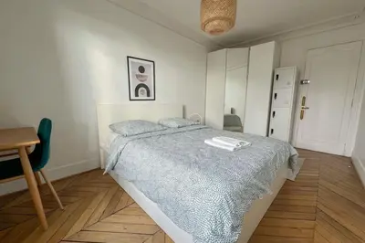 Un ou plusieurs lits dans un hébergement de l'établissement Flexliving - whole flat - Voltaire