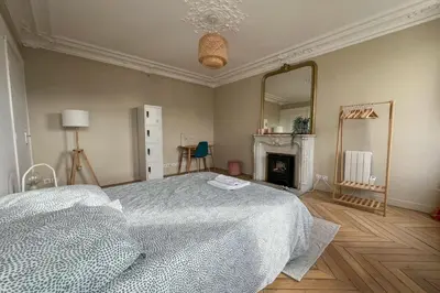 Un ou plusieurs lits dans un hébergement de l'établissement Flexliving - whole flat - Voltaire