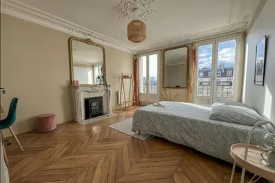 Un ou plusieurs lits dans un hébergement de l'établissement Flexliving - whole flat - Voltaire