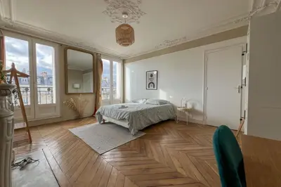 Un ou plusieurs lits dans un hébergement de l'établissement Flexliving - whole flat - Voltaire