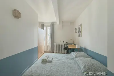 Un ou plusieurs lits dans un hébergement de l'établissement Flexliving - room - Batelière