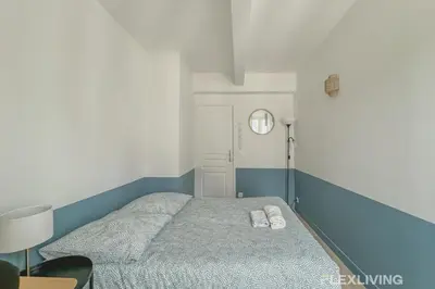 Un ou plusieurs lits dans un hébergement de l'établissement Flexliving - room - Batelière