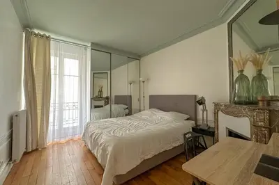 Un ou plusieurs lits dans un hébergement de l'établissement Flexliving - room - Bachaumont