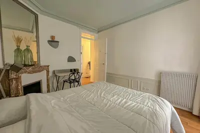Un ou plusieurs lits dans un hébergement de l'établissement Flexliving - room - Bachaumont