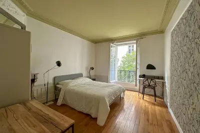 Un ou plusieurs lits dans un hébergement de l'établissement Flexliving - room - Bachaumont