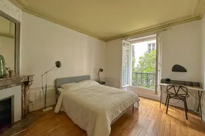 Un ou plusieurs lits dans un hébergement de l'établissement Flexliving - room - Bachaumont