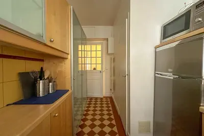 Cuisine ou kitchenette dans l'établissement Flexliving - room - Bachaumont