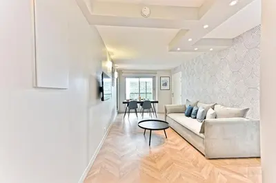 Coin salon dans l'établissement Appartement spacieux et paisible Paris 19ème
