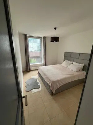Un ou plusieurs lits dans un hébergement de l'établissement Paris La Défense - appart 3 chambre