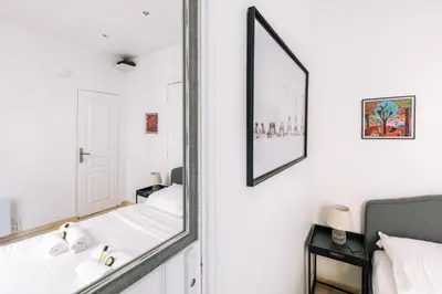 Un ou plusieurs lits dans un hébergement de l'établissement GuestReady - Cosy Apartment in Le Marais