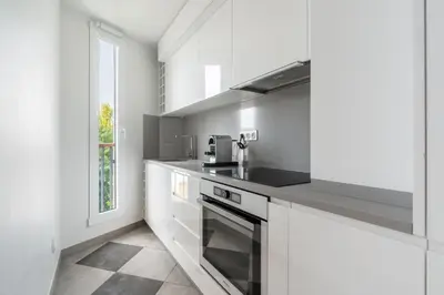 Cuisine ou kitchenette dans l'établissement L'Auguste - Face RER B - Free Parking