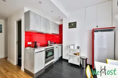 Cuisine ou kitchenette dans l'établissement Charming Studio -2 persons - Paris 10