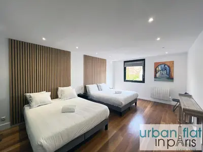 Un ou plusieurs lits dans un hébergement de l'établissement Urban Flat 168 - Spacious 1-Bedroom Apartment in Paris