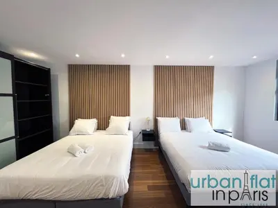 Un ou plusieurs lits dans un hébergement de l'établissement Urban Flat 168 - Spacious 1-Bedroom Apartment in Paris