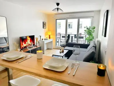Coin salon dans l'établissement Celine 21 Appartement cosy aux portes de Paris