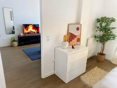 Télévision ou salle de divertissement dans l'établissement Celine 21 Appartement cosy aux portes de Paris