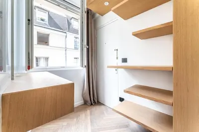 Un ou plusieurs lits dans un hébergement de l'établissement Le Chic Marais Parisien