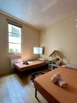 Un ou plusieurs lits dans un hébergement de l'établissement Paris Marais 8RDL Home - 2 rooms, 2 bathrooms, terrace