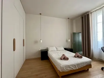 Un ou plusieurs lits dans un hébergement de l'établissement Paris Marais 8RDL Home - 2 rooms, 2 bathrooms, terrace