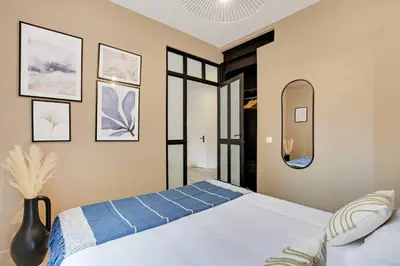Un ou plusieurs lits dans un hébergement de l'établissement Lovely apartment - 1BR-4P - Buttes-Chaumont