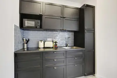 Cuisine ou kitchenette dans l'établissement Lovely apartment - 1BR-4P - Buttes-Chaumont