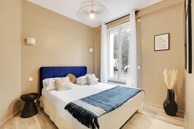 Un ou plusieurs lits dans un hébergement de l'établissement Lovely apartment - 1BR-4P - Buttes-Chaumont