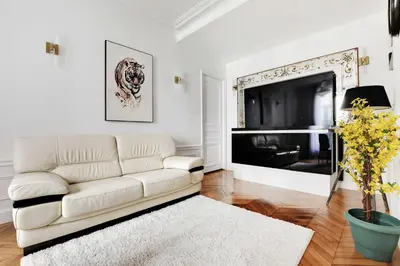 Télévision ou salle de divertissement dans l'établissement Dazzling flat - 3BD8P - Arc de Triomphe