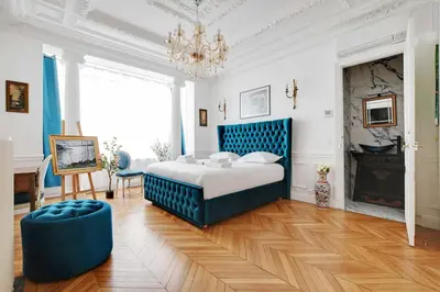 Un ou plusieurs lits dans un hébergement de l'établissement Luxurious flat - 4BD8P - Arc de Triomphe